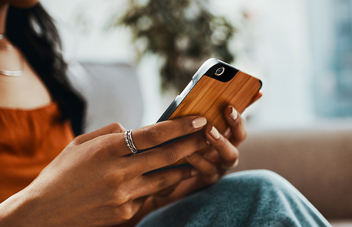 Person holding their phone.
